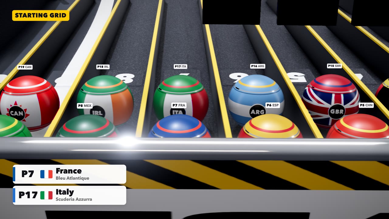 20 national flag marbles lined up on the starting grid